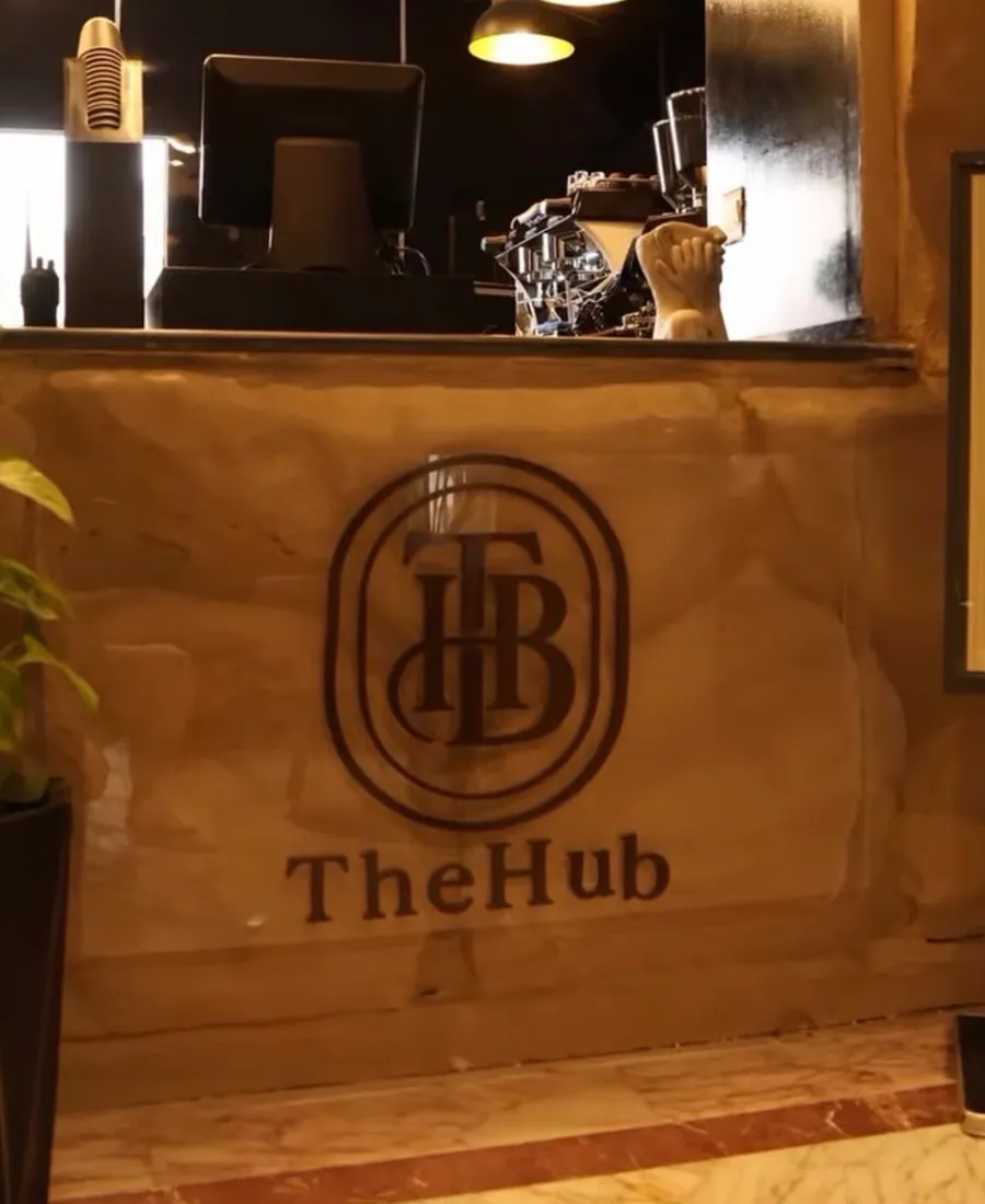 The engraved TheHub monogram on the coffee bar
