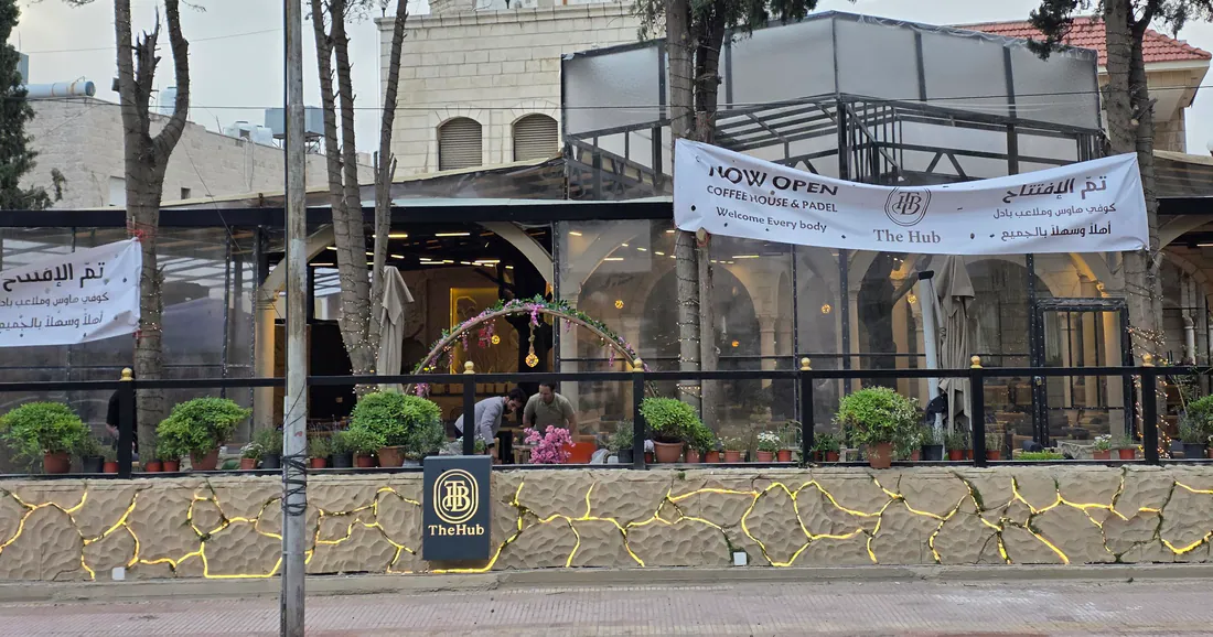 The Hub's opening banner: coffee house and padel, welcome everybody